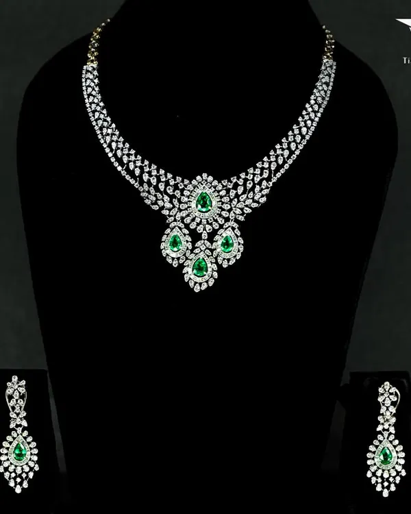 Some pieces do not just complete a look, they tell a story. This emerald and diamond set is the story of grace, boldness, and timeless charm, ensuring you are the unforgettable moment.