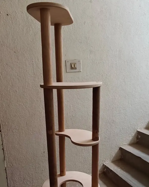 A custom cat tree, built by Swapnil and Poonam over a two-day workshop. Now their cat has a dedicated space to relax and play.
