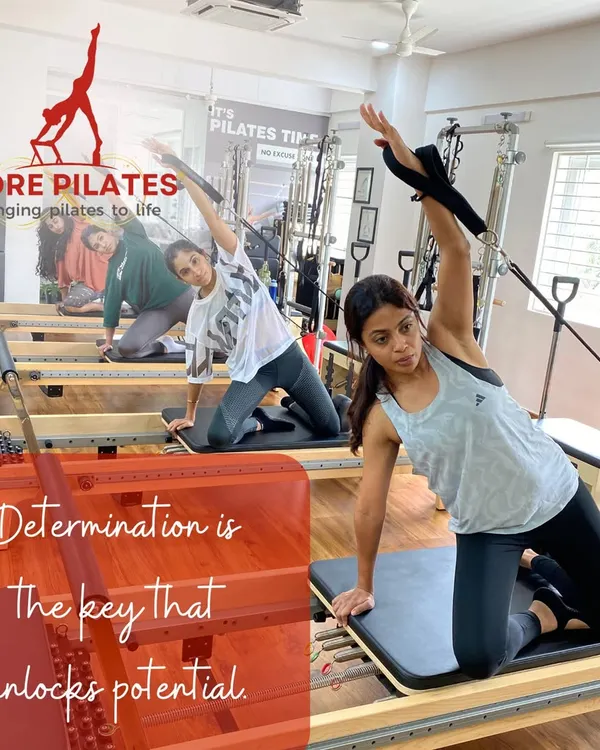 In our small group classes, everyone gets the attention they need. Here, clients are performing a synchronized mermaid stretch, focusing on oblique strength and spinal mobility.