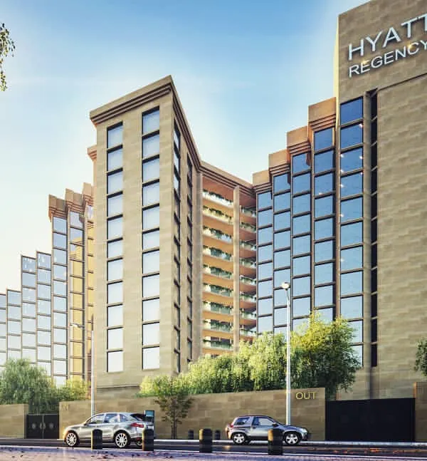 This is an architectural visualization we created for a commercial hospitality project, the Hyatt Regency. Our render showcases the building's modern, staggered facade in a realistic urban setting, essential for planning and marketing.