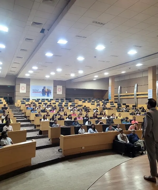 This wide angle shot shows our Partner, Saurabh Bindal, addressing a large audience of law students at Mahindra University. His presentation focused on sharing practical insights into the legal profession, reflecting our commitment to fostering future legal talent.