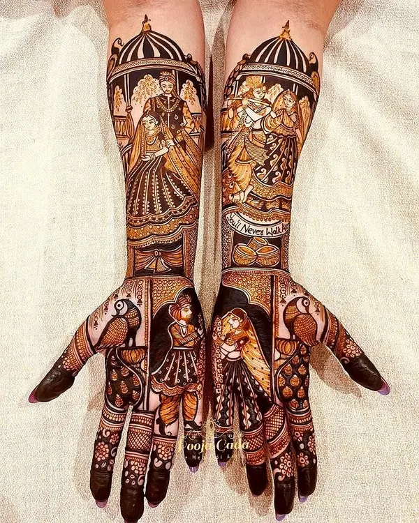 This is a masterpiece of storytelling henna. The design incorporates portraits of the couple, a depiction of Radha and Krishna, and other figures from the wedding ceremony, creating a complete narrative on the arms.