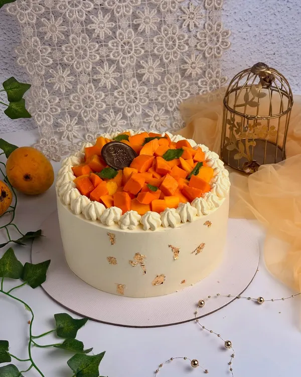 My seasonal Mango Gateau, made with fresh, farm-sourced mangoes and a light, airy cream. There are no artificial flavors here, just the pure taste of summer.