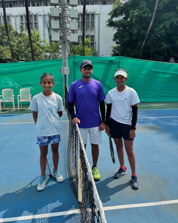 A coach with two junior players at the Inter School Tennis Tournament 2024 at Bombay Gymkhana, an event with over 530 entries that we helped organize.
