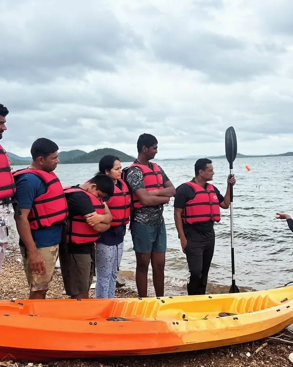Safety and proper technique are our first priorities. Here, an instructor gives a shore-side briefing to a group of participants before they head out for a kayaking session at Vani Vilas Sagar.