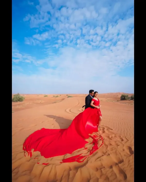 A stunning pre-wedding shoot in the Dubai desert. We work with couples globally, helping them plan their sangeet and wedding performances no matter where they are.