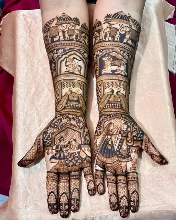 This is our signature portrait work. The design features a detailed bride and groom varmala scene, a depiction of Lord Ganesha, and a beautiful doli scene, all rendered with incredible precision.