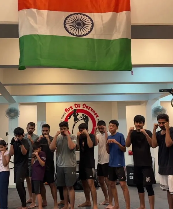 Hands up, chin down, ready to work. This is the AOD tribe, a mix of men, women, and kids united under one flag with a common purpose.