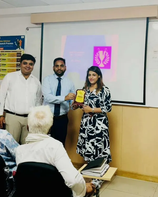 A proud moment receiving an award for professional excellence. These milestones are not just personal wins but a reflection of the trust my clients place in me.