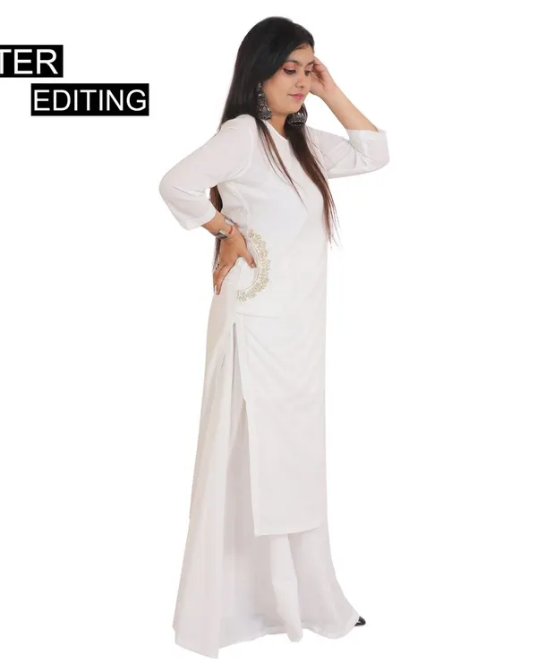 An 'after editing' shot of a model in a white kurti set against a pure white background. This is the final, polished image you get, ready for your Amazon or Myntra listing.