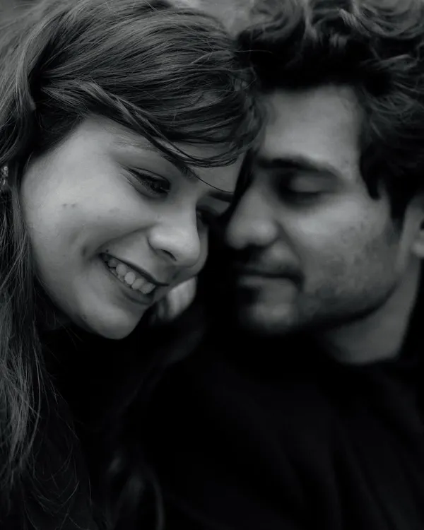 A soft and intimate black and white close-up. This portrait of Nikunj and Mansi is all about tenderness, capturing a quiet moment of connection that feels incredibly personal.