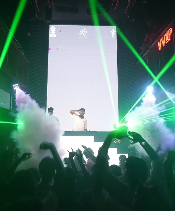 The full club experience. I combine electrifying music with dynamic visuals like CO2 cannons and lasers to create a sensory overload that keeps the party going all night.