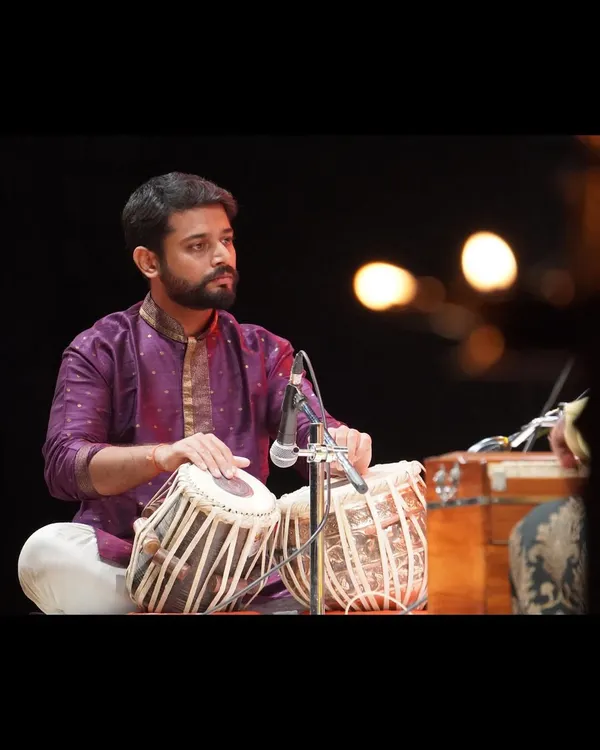 Deeply focused during a performance at the Megh Malhar Festival at Nehru Centre, Mumbai. For me, every concert is a form of meditation, a space where I connect with the music and the audience.