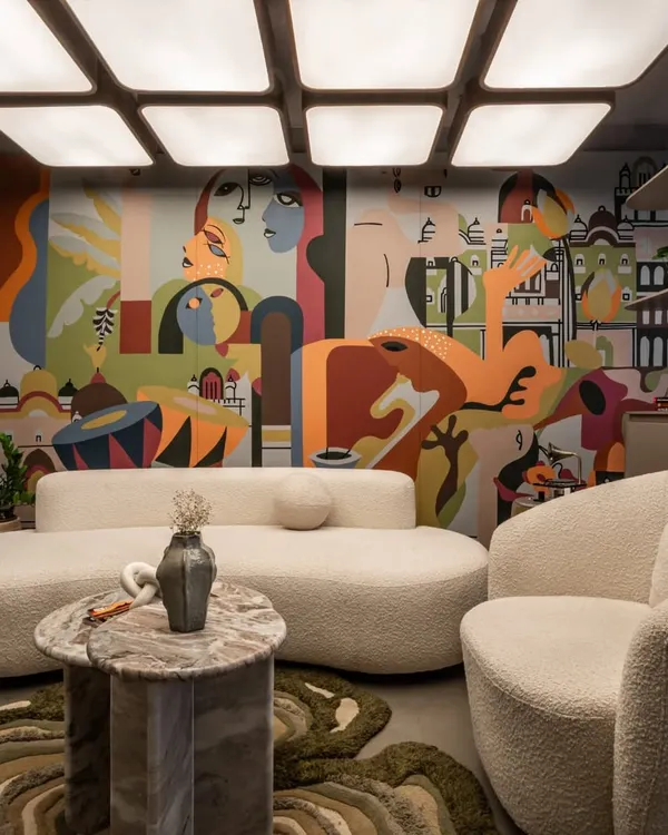 A full view of our mural for a wedding planner's office, designed to embody drama, chaos, and choreography. The artwork blends cityscapes, folk elements, and modern abstraction to tell a story of vibrant celebrations.