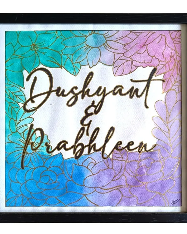 This custom nameplate for Dushyant and Prabhleen is one of my favorite pieces. I blended a cool blue and soft purple watercolor wash, then overlaid it with a delicate floral line art to frame their names, creating a truly personal piece of home decor.