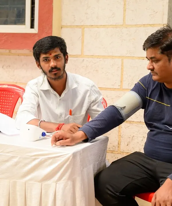 A glimpse from our free Bone Mineral Density camp, where I am conducting a health check-up. Community outreach is an important part of my mission to make Ayurvedic care accessible.