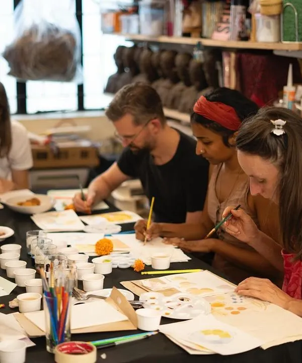 A group of creators completely absorbed in one of our botanical ink painting workshops. We love hosting these intimate sessions where artists can gather around a table, share ideas, and learn a new skill together in a relaxed, supportive environment.
