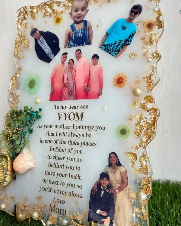A beautiful and heartfelt personalized resin photo frame. I can help you create a similar keepsake with your own photos and messages.