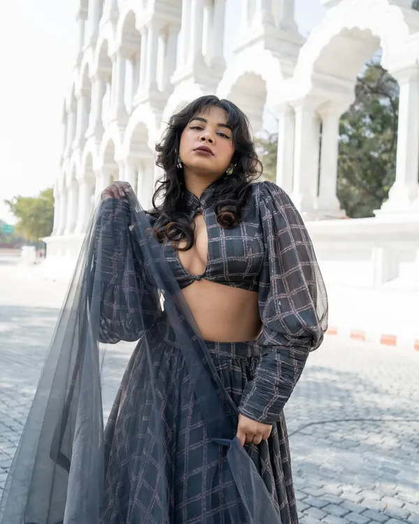 Who said wearing Indian can't be fun and playful? This fashion-forward grey plaid lehenga is a perfect Indo-Western look.