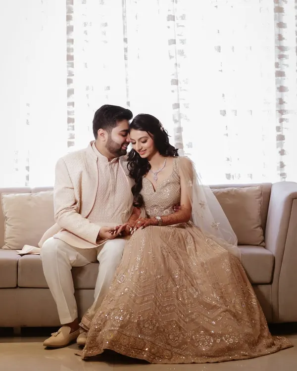 A quiet moment on the couch, away from the wedding hustle. We look for these simple, intimate settings to capture the natural chemistry between a couple.