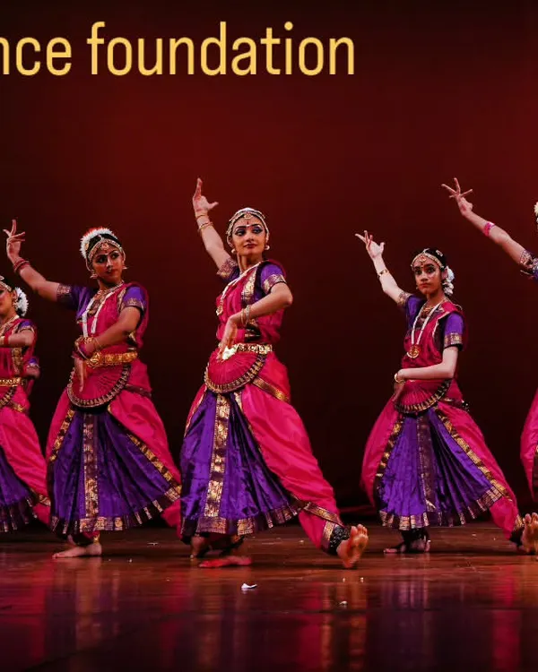 Our senior Bharatanatyam students in a full-costume performance. This is the culmination of years of dedicated practice, showcasing their grace, precision, and deep understanding of the art form.