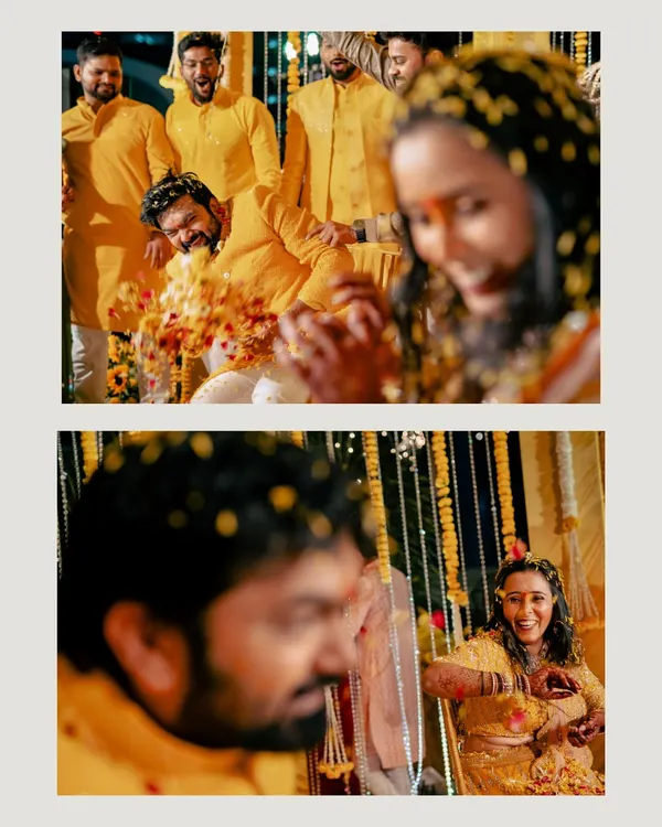 The pure joy and playful chaos of a haldi ceremony, as the couple and their friends are showered with flower petals.