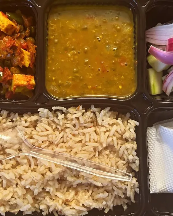 My special Diet Thali, designed for the health-conscious. This meal includes high-protein tofu paneer sabzi, yellow dal, and nutritious brown rice instead of white.
