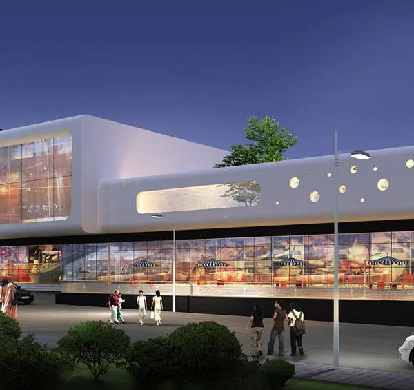A night-time render of the Renukoot Mall, designed for Hindalco Industries. The futuristic facade combines straight and rounded surfaces with circular punctures, creating a visually engaging landmark for the region.