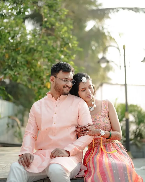 A close-up of a couple sharing a quiet, happy moment during their engagement photoshoot.
