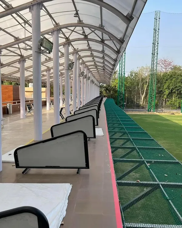 A view down the line of our upper-tier driving bays. Each bay provides a clean, spacious area for you to focus on your practice session.