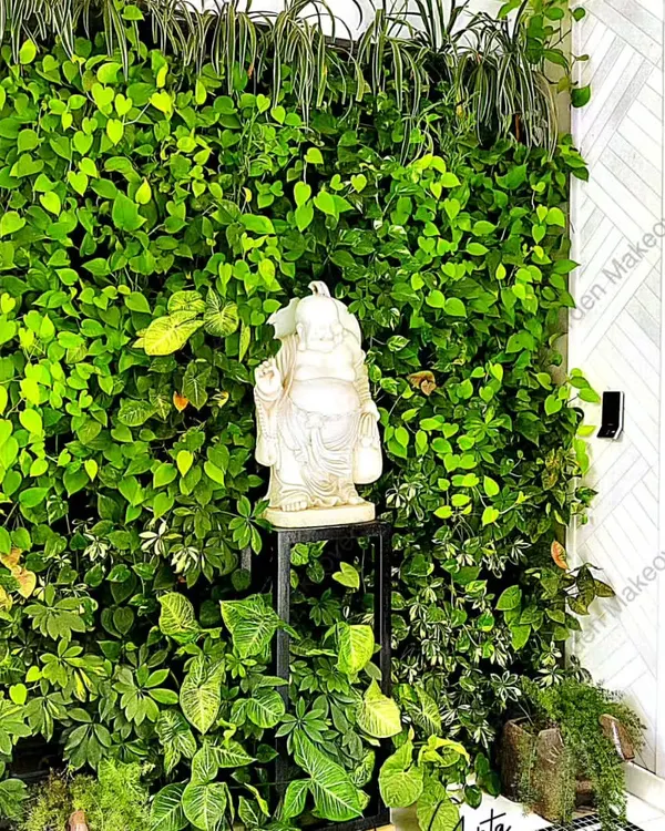 This is one of my favorite living wall installations. The variety of real plants with different leaf shapes and shades of green creates a rich, organic tapestry that brings a sense of calm and natural beauty indoors.