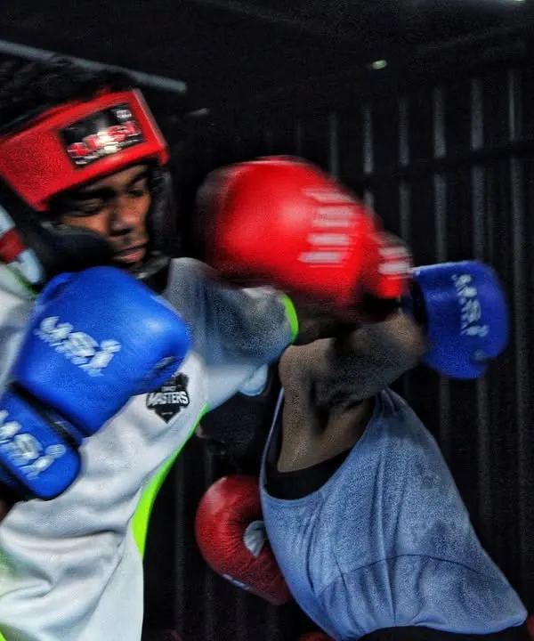 A clean shot from a Friday morning sparring session. Here you see a fighter landing a jab while maintaining his guard, a fundamental of good boxing defense.
