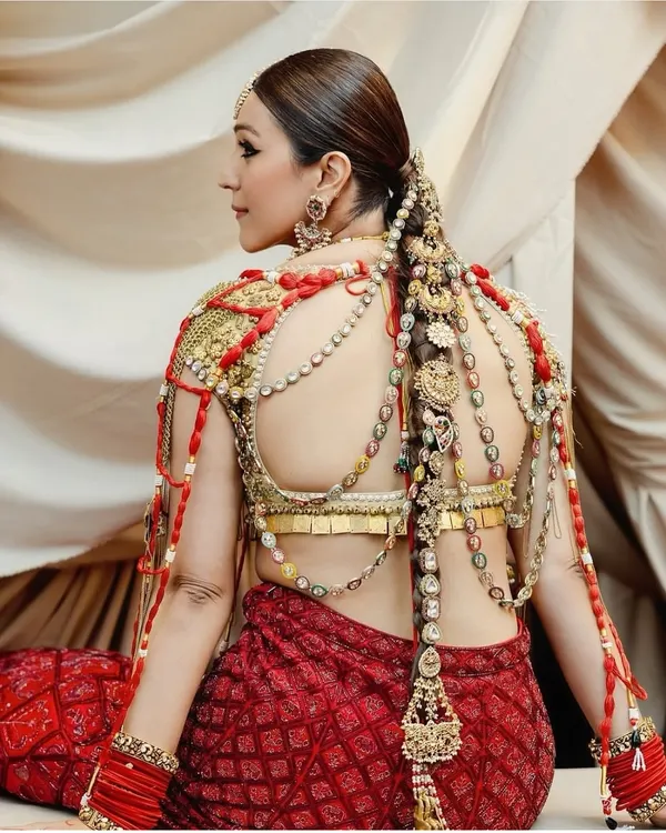 This is one of my favorite creations, a timeless braid intricately woven with real jewelry. I believe a hairstyle should be a work of art, and this look, created for a special celebration, weaves together tradition and high fashion.