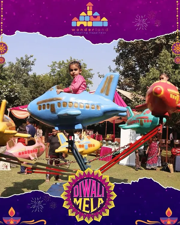 Our Diwali Mela is a whirlwind of fun, and the carnival rides are always a highlight. Seeing a child's face light up with pure excitement as they soar on an airplane ride captures the very essence of the happiness we aim to create.