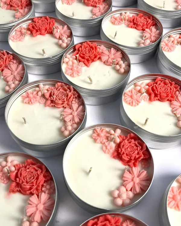 This week's top picks are lighting up hearts! This image shows a bulk order of my floral tin candles, a popular choice for return favors.