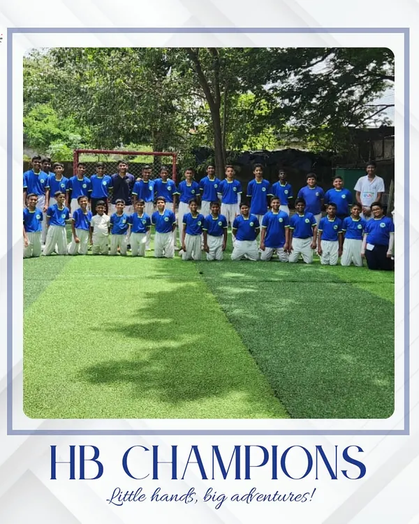 This is where greatness begins. A team of HB Champions kneels on the turf, representing the discipline and unity forged during our training sessions.