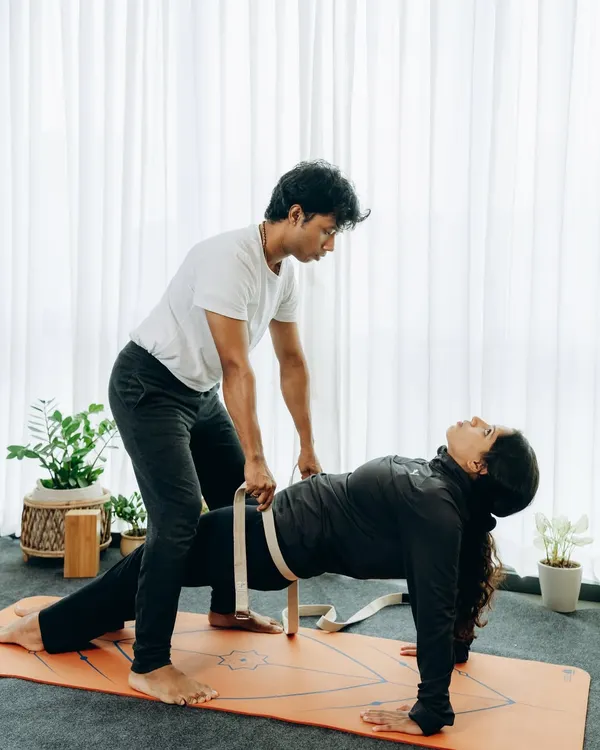 Using a yoga strap, we guide you into a safe and effective Purvottanasana (Upward Plank Pose). This adjustment helps lift the hips and open the chest without straining the shoulders, ensuring you build strength correctly.