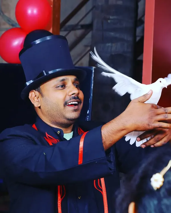 The magical appearance of a live dove is a beautiful and surprising moment in my show. This is a classic illusion that always leaves the audience in awe.