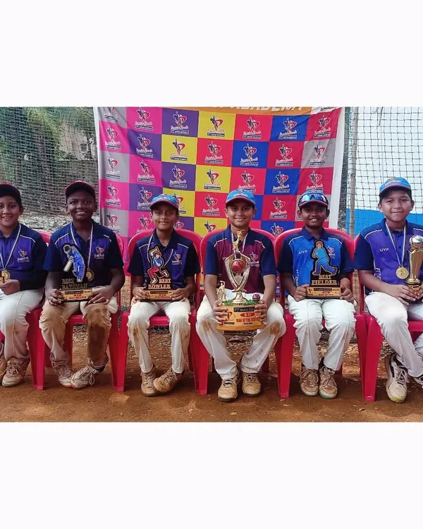 The individual award winners of the U-12 PTPL 2024, proudly displaying their trophies for categories like Man of the Series, Best Batsman, and Best Bowler.