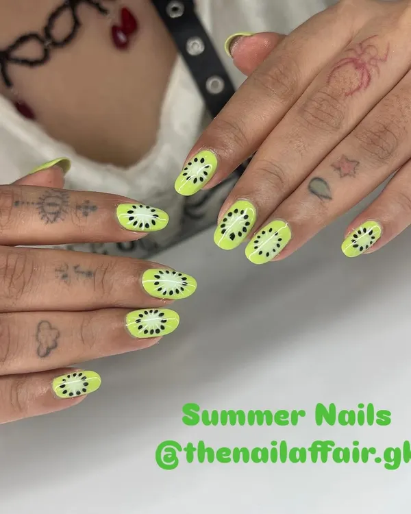 This playful kiwi nail art is one of my favorites for a fun, summery look. Each slice is hand-painted to bring a fresh and unique style to your fingertips.