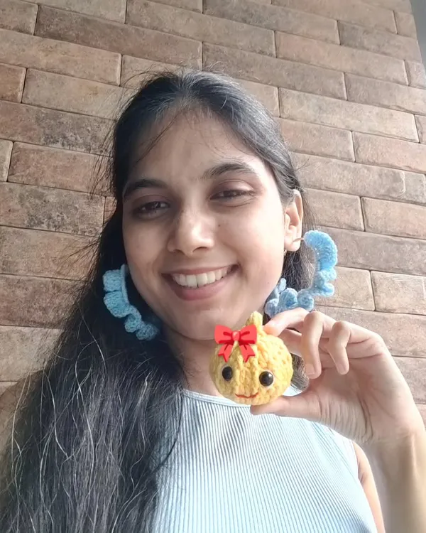 Me, holding up my award-winning Modak creation.