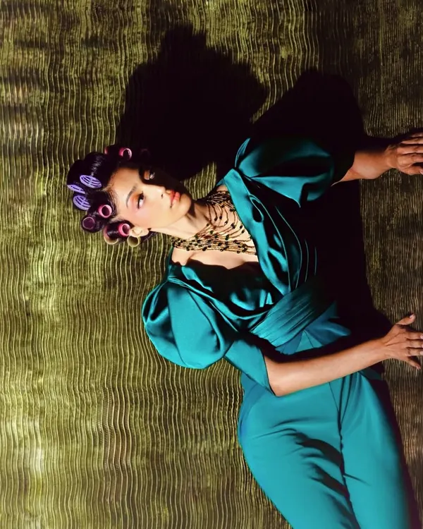 A retro-inspired look for a fashion editorial. I used a vibrant pink eyeshadow and styled the hair in rollers to create a fun, vintage vibe.