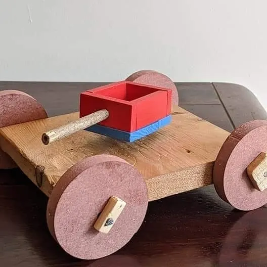 This wooden tanker was handmade by an eight year old boy over seven hours. He started with a manual drill, built a table with wheels, added a seat, and then transformed it into this creation, all driven by his own curiosity. This is what I believe in: the process is the prize, and true learning flows when a child is deeply immersed in their work.