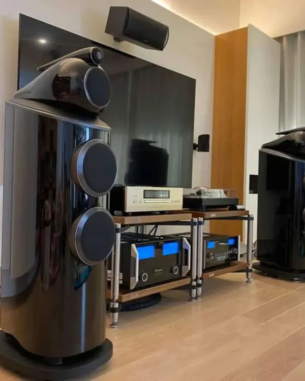 An audiophile's dream setup featuring flagship Bowers & Wilkins floor-standing speakers. We provide and install high-end audio components for unparalleled sound fidelity in your living room or dedicated theater.