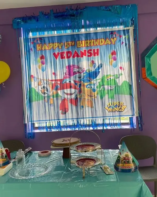 Getting the party started for Vedansh's 5th birthday with a vibrant Super Wings theme. We set up the backdrop and decorations to create an immersive experience from the moment guests arrive.