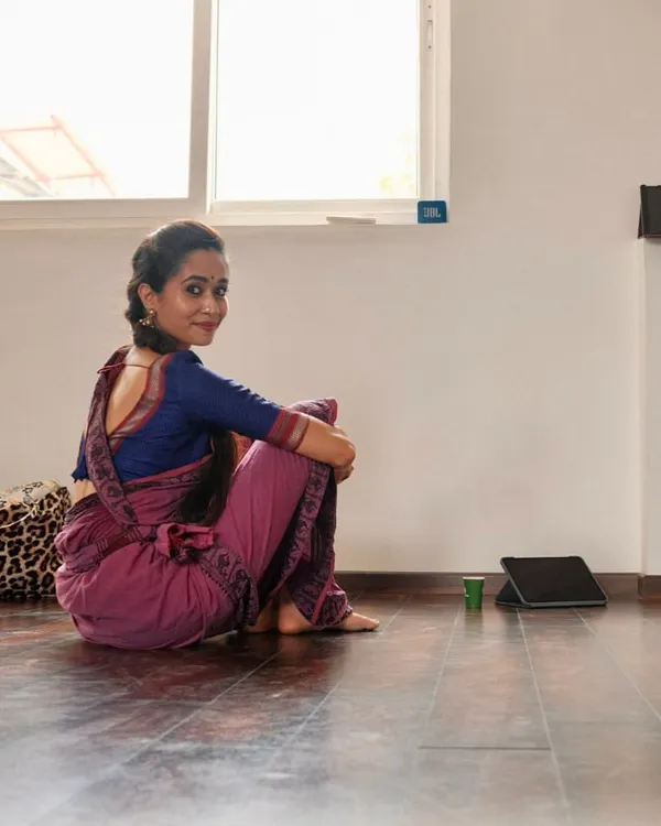 Just me in my favorite space. The studio gets beautiful natural light during the day, which creates a warm and inviting atmosphere for practice or a photoshoot.