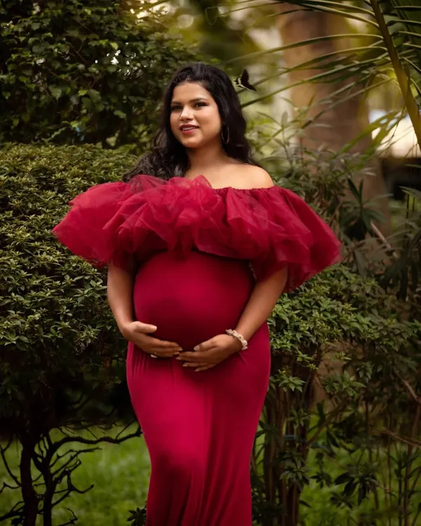 This outdoor maternity session was a dream! The gorgeous red gown against the lush greenery created such a powerful and beautiful portrait of this glowing Mumma.