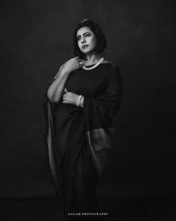 In the drape of a saree, she carries her heritage. This black and white portrait is a modern take on traditional wear, full of grace and strength.