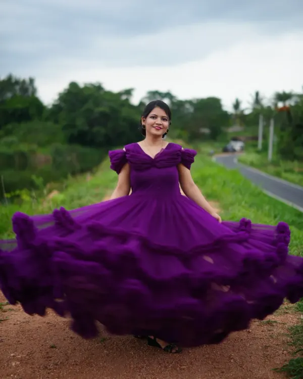 This is what I mean by an epic shoot. I provide stunning rental gowns, like this vibrant purple one, and find the perfect outdoor location in Bangalore to create a scene straight out of a movie. You just show up and enjoy the moment.