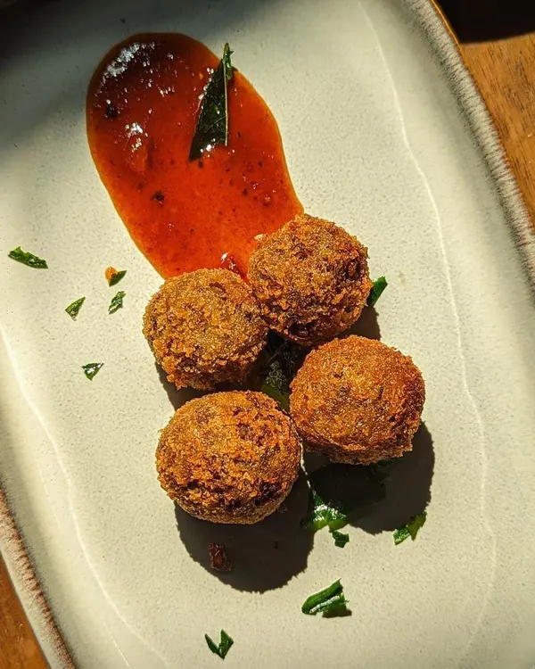 In Kerala, we make cutlets out of everything, but my heart belongs to beef cutlets. Crispy on the outside and tender on the inside, they are a must-have appetizer for any event. I serve them with my special homemade ketchup.
